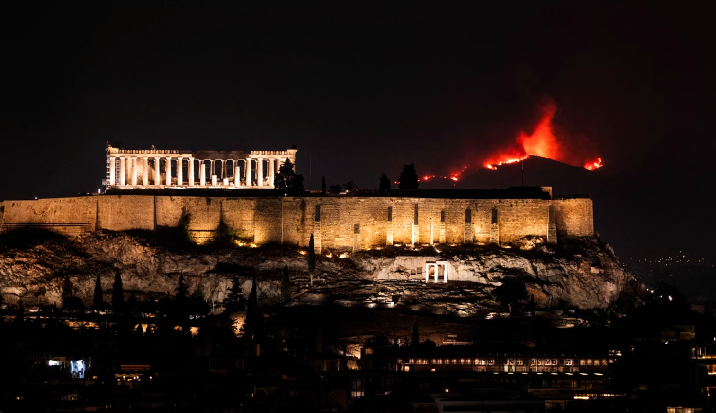 A wildfire burns, seen behind the Parthenon, in Athens, on August 23, 2023. #
Andrea Bonetti / SOOC / AFP / Getty
